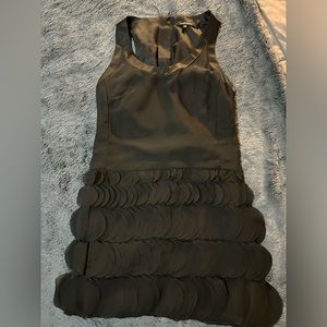 Nanette Lepore, sleeveless drop waist black dress with.frills.